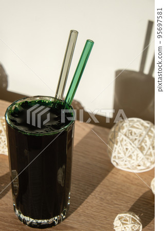 Blue-green algae Chlorella and spirulina powder. Super powder. Natural supplement of algae. Detox superfood drink cocktail. Food supplement source of protein and beta carotene Blue-green algae Chlorella and spirulina powder. Super powder. Natural supplement of algae. Detox superfood drink cocktail. Food supplement source of protein and beta carotene 95697581