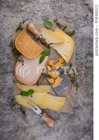 Parmesan, cheddar, gouda and maasdam cheese Parmesan, cheddar, gouda and maasdam cheese 95698022