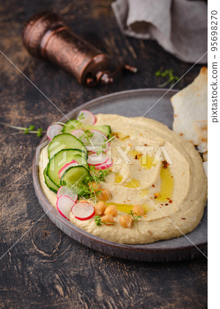 Hummus from chickpeas and pita bread. 95698270