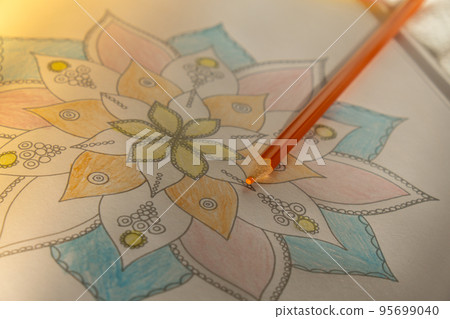Mandalas antistress page to combat stress. Relaxing hobby mental wellbeing and art therapy. Meditative process of coloring pages. Self expression by art Mandalas antistress page to combat stress. Relaxing hobby mental wellbeing and art therapy. Meditative process of coloring pages. Self expression by art 95699040