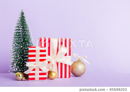 Christmas composition. craft Gift box, small tree, branches and craft DIY decorations on white background. New year concept. Christmas home decoration Flat lay, top view, copy space Christmas composition. craft Gift box, small tree, branches and craft DIY decorations on white background. New year concept. Christmas home decoration Flat lay, top view, copy space 95699203