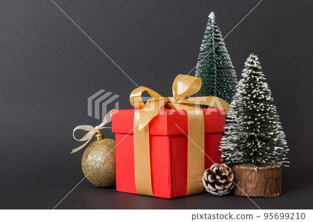 Christmas composition. craft Gift box, small tree, branches and craft DIY decorations on white background. New year concept. Christmas home decoration Flat lay, top view, copy space Christmas composition. craft Gift box, small tree, branches and craft DIY decorations on white background. New year concept. Christmas home decoration Flat lay, top view, copy space 95699210