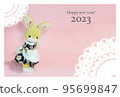 New Year's card with stuffed rabbit in cute clothes 95699847