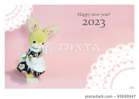 New Year's card with stuffed rabbit in cute clothes 95699847