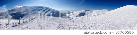 Sun over winter mountains, covered with snow Sun over winter mountains, covered with snow 95700590