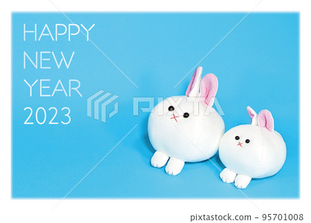 New Year's card with a stuffed toy of two good friends rabbits New Year's card with a stuffed toy of two good friends rabbits 95701008