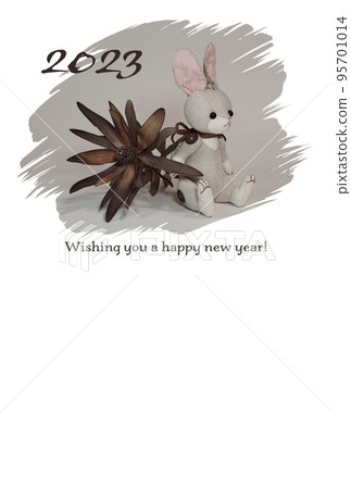 New Year's card with stuffed rabbit and dried flowers 95701014