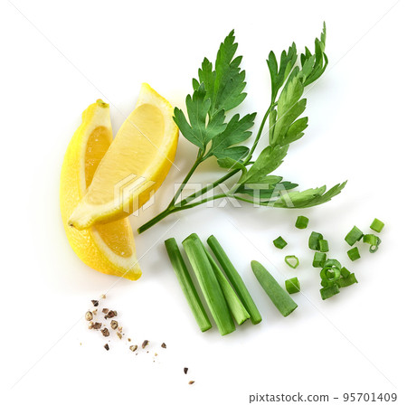 cut of lemon and parsley cut of lemon and parsley 95701409
