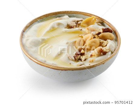 bowl of greek yogurt with honey and nuts bowl of greek yogurt with honey and nuts 95701412