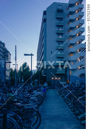 bicycle parking lot at sunset bicycle parking lot at sunset 95702399