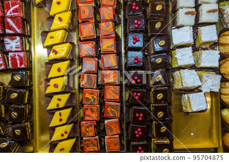 Assortment of delicious and colorful dessert with chocolate Assortment of delicious and colorful dessert with chocolate 95704875