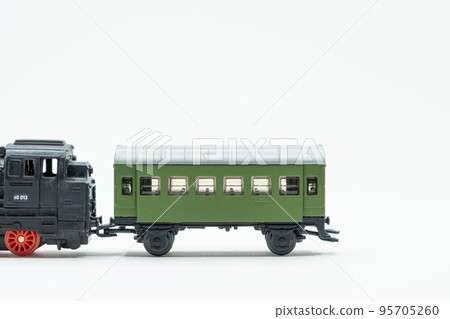 Partial view of vintage train toy on white background 95705260