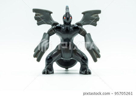 Scary black monster toy with wings and red eyes Scary black monster toy with wings and red eyes 95705261