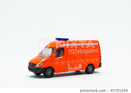 Orange and white german ambulance van car toy Orange and white german ambulance van car toy 95705284