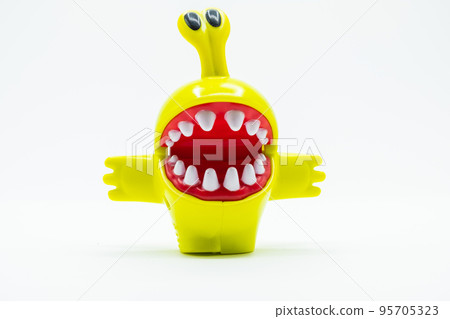 Toy monster with high eyes on white background Toy monster with high eyes on white background 95705323