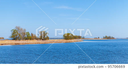 Coastal landscape of Volga river on a sunny day 95706669