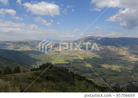 Summer mountain landscape in the USA. Sunny day and cloudy sky, hills view 95706689