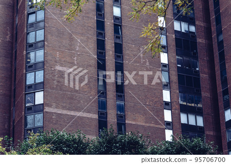 Red Brick residential buildings in New York City at Cloudy weather, USA Red Brick residential buildings in New York City at Cloudy weather, USA 95706700