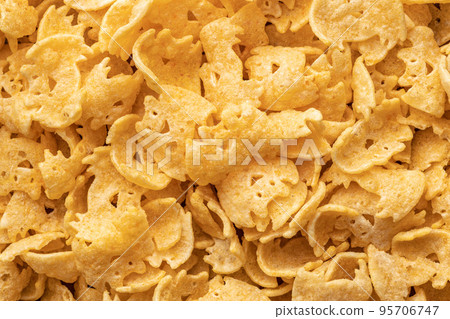 Halloween crispy bat shaped chips. Top view. Halloween crispy bat shaped chips. Top view. 95706747