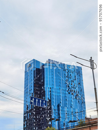 Kyiv, Ukraine - October 22, 2022: Business center building was hit by Russian shelling Kyiv, Ukraine - October 22, 2022: Business center building was hit by Russian shelling 95707696