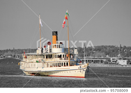 Old steamlboat floating on Geneva lake, Switzerland. 95708009