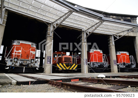 Tsuyama Learning Railway Museum Diesel locomotives lined up in the fan-shaped locomotive depot 95709023