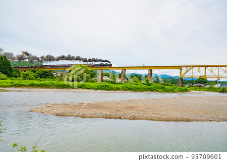 Fukushima Train running on the iron bridge Fukushima Train running on the iron bridge 95709601