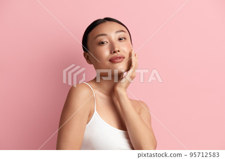 Tender Woman Touching Chick. Portrait of Positive Asian Woman Touching her Face 95712583