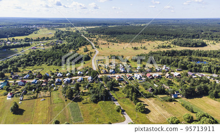 view from a height on a rural landscape with houses view from a height on a rural landscape with houses 95713911