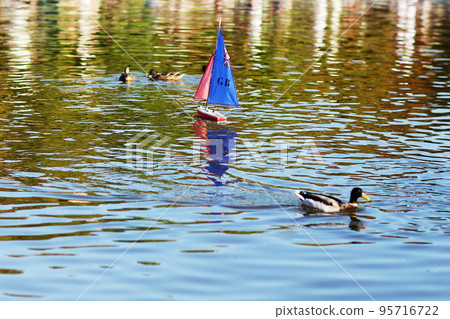 Photo on theme of lonely toy boat 95716722