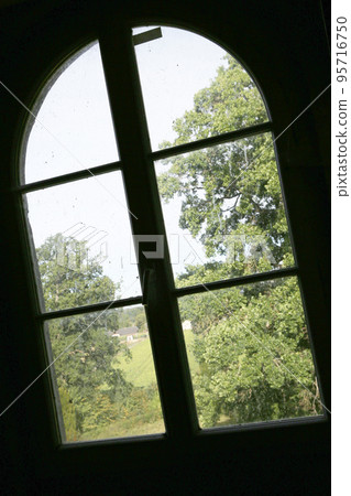 Beautiful wooden frame window in old building without people Beautiful wooden frame window in old building without people 95716750