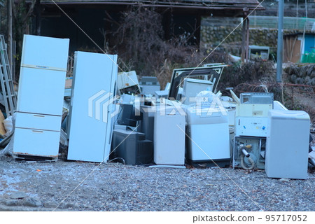 White goods lined up in a garbage dump White goods lined up in a garbage dump 95717052