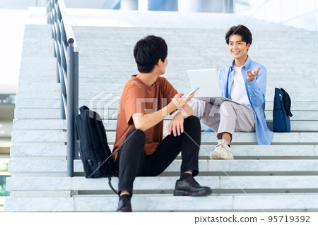 Male college student campus life student smartphone computer 95719392
