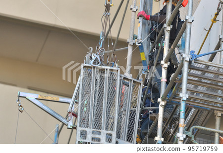 Large-scale repair of an apartment building Temporary scaffolding for painting work 95719759