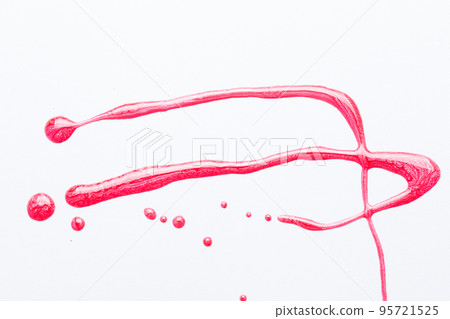 Nail polish on a white background in the form of strips and drops. Nail polish on a white background in the form of strips and drops. 95721525