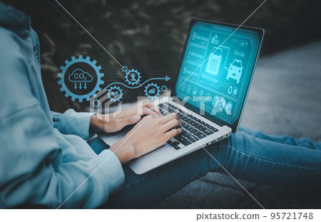 Man using laptop with global network connection with virtual modern reduce CO2 emission concept with icons, global warming emissions carbon footprint climate change to limit global warming, energy Man using laptop with global network connection with virtual modern reduce CO2 emission concept with icons, global warming emissions carbon footprint climate change to limit global warming, energy 95721748