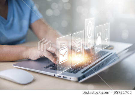 Businesswoman working smartphone with laptop and sign of the top service Quality assurance, Guarantee, Standards, ISO certification and standardization, concept Quality assurance of business services, 95721763