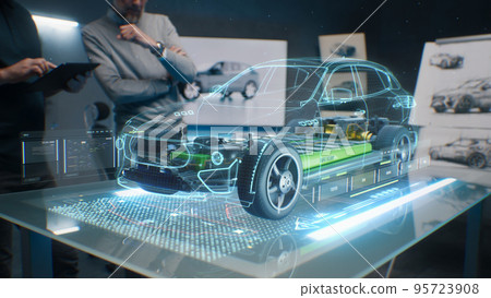 Engineers using tablet with holographic innovative application Engineers using tablet with holographic innovative application 95723908