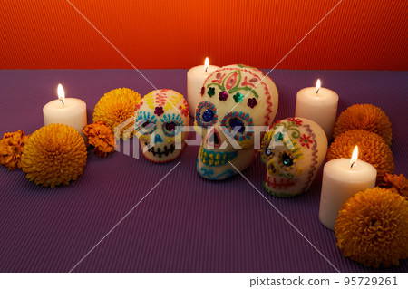 Dia de los muertos - Day of the dead Sugar skull with candles, and cempasuchil flowers altar decoration. 95729261