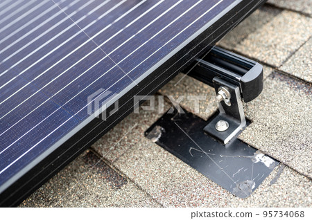 Rail, bracket, and anchor to a solar panel installed on a asphalt shingle roof Rail, bracket, and anchor to a solar panel installed on a asphalt shingle roof 95734068