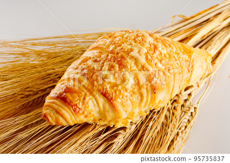 Fresh croissants with cheese. traditional hommade french pastries for breakfast 95735837