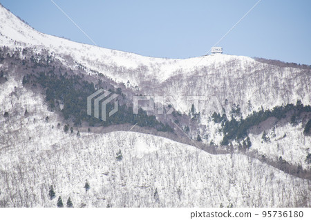 Snow-capped Mount Kamagusan seen from Mutsu City, Aomori Prefecture 95736180