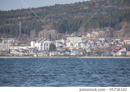 Snow-capped Mount Kamagusan seen from Mutsu City, Aomori Prefecture 95736182