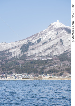 Snow-capped Mount Kamagusan seen from Mutsu City, Aomori Prefecture Snow-capped Mount Kamagusan seen from Mutsu City, Aomori Prefecture 95736185