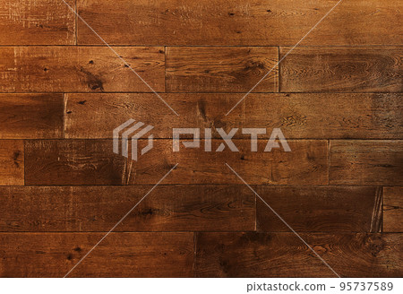Horizontal background image of aged floorboards of reddish-brown rough-grained sawn timber Horizontal background image of aged floorboards of reddish-brown rough-grained sawn timber 95737589