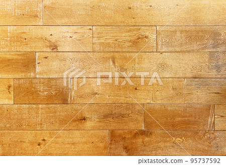 Horizontal background image of aged floorboards of coarse lumber in light brown color 95737592