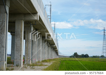 Elevated tracks of the Hokuriku Shinkansen laid out in rice fields | Komatsu City, Ishikawa Prefecture 95737664