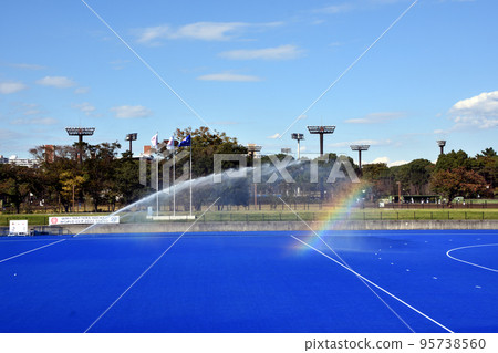 Oi 曲棍球場在水下與灑水器 Oi 曲棍球場在水下與灑水器 95738560