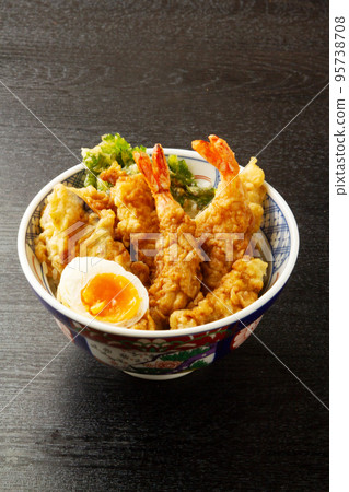 Bowl of rice and fried fish 95738708