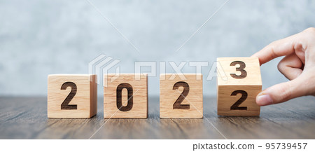 hand flip 2022 to 2023 block. goal, Resolution, strategy, plan,, motivation, reboot, forecast, change, countdown and New Year holiday concepts 95739457